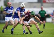 14 May 2022; Ben Conroy of Laois is tackled by Jack Gealish of Galway during the Leinster GAA Hurling Senior Championship Round 4 match between Laois and Galway at MW Hire O’Moore Park in Portlaoise, Laois. Photo by Ray McManus/Sportsfile