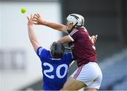 14 May 2022; PJ Scully of Laois and Daithí Burke of Galway both reach for the sliotar during the Leinster GAA Hurling Senior Championship Round 4 match between Laois and Galway at MW Hire O’Moore Park in Portlaoise, Laois. Photo by Ray McManus/Sportsfile