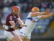 14 May 2022; Conor Whelan of Galway shoots past Laois goalkeeper Enda Rowland to score a goal during the Leinster GAA Hurling Senior Championship Round 4 match between Laois and Galway at MW Hire O’Moore Park in Portlaoise, Laois. Photo by Ray McManus/Sportsfile
