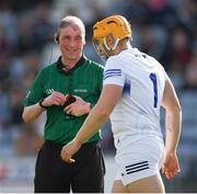 14 May 2022; Referee Sean Cleere smiles as he prepares to issue a yellow card to Laois goalkeeper Enda Rowland during the Leinster GAA Hurling Senior Championship Round 4 match between Laois and Galway at MW Hire O’Moore Park in Portlaoise, Laois. Photo by Ray McManus/Sportsfile