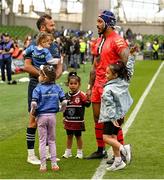 14 May 2022; Jamison Gibson-Park of Leinster and Pita Ahki of Toulouse, holding their daughters, speak after the Heineken Champions Cup Semi-Final match between Leinster and Toulouse at the Aviva Stadium in Dublin. Photo by Harry Murphy/Sportsfile