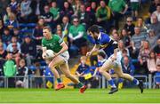 14 May 2022; Hugh Bourke of Limerick in action against Shane O'Connell of Tipperary during the Munster GAA Senior Football Championship Semi-Final match between Tipperary and Limerick at FBD Semple Stadium in Thurles, Tipperary. Photo by Diarmuid Greene/Sportsfile