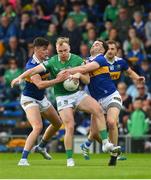 14 May 2022; Adrian Enright of Limerick in action against Conall Kennedy and Sean O'Connell of Tipperary during the Munster GAA Senior Football Championship Semi-Final match between Tipperary and Limerick at FBD Semple Stadium in Thurles, Tipperary. Photo by Diarmuid Greene/Sportsfile