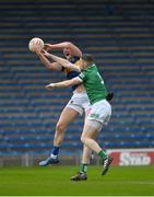 14 May 2022; Conor Sweeney of Tipperary in action against Brian Fanning of Limerick during the Munster GAA Senior Football Championship Semi-Final match between Tipperary and Limerick at FBD Semple Stadium in Thurles, Tipperary. Photo by Mark Sheahan /Sportsfile