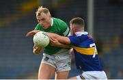14 May 2022; Adrian Enright of Limerick in action against Jack Harney of Tipperary during the Munster GAA Senior Football Championship Semi-Final match between Tipperary and Limerick at FBD Semple Stadium in Thurles, Tipperary. Photo by Diarmuid Greene/Sportsfile