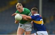 14 May 2022; Adrian Enright of Limerick in action against Jack Harney of Tipperary during the Munster GAA Senior Football Championship Semi-Final match between Tipperary and Limerick at FBD Semple Stadium in Thurles, Tipperary. Photo by Diarmuid Greene/Sportsfile