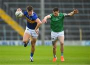 14 May 2022; Steven O'Brien of Tipperary in action against Iain Corbett of Limerick during the Munster GAA Senior Football Championship Semi-Final match between Tipperary and Limerick at FBD Semple Stadium in Thurles, Tipperary. Photo by Diarmuid Greene/Sportsfile