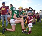 14 May 2022; Aaron Craig of Westmeath celebrates with his son Oisín, aged 3, after the Leinster GAA Hurling Senior Championship Round 4 match between Westmeath and Wexford at TEG Cusack Park in Mullingar, Westmeath. Photo by Daire Brennan/Sportsfile