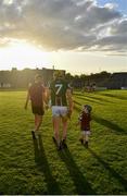 14 May 2022; Aaron Craig of Westmeath and his son Oisín, aged 3, go to the warm-down, after the Leinster GAA Hurling Senior Championship Round 4 match between Westmeath and Wexford at TEG Cusack Park in Mullingar, Westmeath. Photo by Daire Brennan/Sportsfile