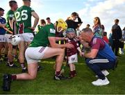 14 May 2022; Aaron Craig of Westmeath and Westmeath manager Joe Fortune celebrate with Aaron's son Oisín, aged 3, after the Leinster GAA Hurling Senior Championship Round 4 match between Westmeath and Wexford at TEG Cusack Park in Mullingar, Westmeath. Photo by Daire Brennan/Sportsfile