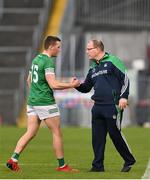 14 May 2022; Limerick manager Billy Lee exchanges a handshake with Hugh Bourke of Limerick as he is substituted during the Munster GAA Senior Football Championship Semi-Final match between Tipperary and Limerick at FBD Semple Stadium in Thurles, Tipperary. Photo by Mark Sheahan /Sportsfile