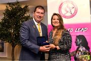 14 May 2022; Emma Murphy of Wanderers GAA club in Ballyboden, Dublin is presented with her graduation medallion by Uachtarán Cumann Peil Gael na mBan, Mícheál Naughton, during the Learn to Lead LGFA Female Leadership Programme graduation evening at the Bonnington Hotel in Dublin. The Learn to Lead programme was devised to develop the next generation of leaders within Ladies Gaelic Football. Photo by Brendan Moran/Sportsfile