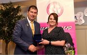 14 May 2022; Catherine Ring of Knocknagree Ladies GAA club in Cork is presented with her graduation medallion by Uachtarán Cumann Peil Gael na mBan, Mícheál Naughton, during the Learn to Lead LGFA Female Leadership Programme graduation evening at the Bonnington Hotel in Dublin. The Learn to Lead programme was devised to develop the next generation of leaders within Ladies Gaelic Football. Photo by Brendan Moran/Sportsfile