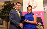 14 May 2022; Amy Butler of Galtee Rovers St Pecaun’s GAA club in Tipperary is presented with her graduation medallion by Uachtarán Cumann Peil Gael na mBan, Mícheál Naughton, during the Learn to Lead LGFA Female Leadership Programme graduation evening at the Bonnington Hotel in Dublin. The Learn to Lead programme was devised to develop the next generation of leaders within Ladies Gaelic Football. Photo by Brendan Moran/Sportsfile