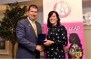 14 May 2022; Jacqui Mulligan of St Farnan’s GAA club in Sligo is presented with her graduation medallion by Uachtarán Cumann Peil Gael na mBan, Mícheál Naughton, during the Learn to Lead LGFA Female Leadership Programme graduation evening at the Bonnington Hotel in Dublin. The Learn to Lead programme was devised to develop the next generation of leaders within Ladies Gaelic Football. Photo by Brendan Moran/Sportsfile