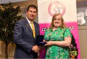 14 May 2022; Tara Dooley of Naomh Muire Íochtar Na Rosann GAA club in Donegal is presented with her graduation medallion by Uachtarán Cumann Peil Gael na mBan, Mícheál Naughton, during the Learn to Lead LGFA Female Leadership Programme graduation evening at the Bonnington Hotel in Dublin. The Learn to Lead programme was devised to develop the next generation of leaders within Ladies Gaelic Football. Photo by Brendan Moran/Sportsfile