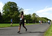 15 May 2022; Runner Omole Osas of Dunshaughlin AC, Meath, during the Irish Runner 5k sponsored by Sports Travel International incorporating the AAI National 5k Road Championships at Phoenix Park in Dublin. Photo by Harry Murphy/Sportsfile