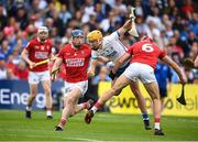 15 May 2022; Jack Prendergast of Waterford in action against Ciarán Joyce, 6, and Sean O’Donoghue of Cork during the Munster GAA Hurling Senior Championship Round 4 match between Waterford and Cork at Walsh Park in Waterford. Photo by Stephen McCarthy/Sportsfile