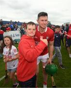 15 May 2022; Cork's Séamus Harnedy with supporter Richard Barrett, from Charleville, after the Munster GAA Hurling Senior Championship Round 4 match between Waterford and Cork at Walsh Park in Waterford. Photo by Stephen McCarthy/Sportsfile