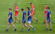 15 May 2022; Monaghan players including, Jack McCarron and Gary Mohan, share a joke during the pre-match parade before the Ulster GAA Football Senior Championship Semi-Final match between Derry and Monaghan at Athletic Grounds in Armagh. Photo by Ramsey Cardy/Sportsfile