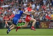 15 May 2022; Conor Glass of Derry in action against Jack McCarron of Monaghan during the Ulster GAA Football Senior Championship Semi-Final match between Derry and Monaghan at Athletic Grounds in Armagh. Photo by Ramsey Cardy/Sportsfile