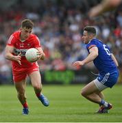 15 May 2022; Shane McGuigan of Derry in action against Dessie Ward of Monaghan during the Ulster GAA Football Senior Championship Semi-Final match between Derry and Monaghan at Athletic Grounds in Armagh. Photo by Ramsey Cardy/Sportsfile