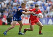 15 May 2022; Ethan Doherty of Derry in action against Kieran Hughes of Monaghan during the Ulster GAA Football Senior Championship Semi-Final match between Derry and Monaghan at Athletic Grounds in Armagh. Photo by Ramsey Cardy/Sportsfile