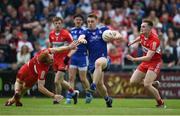 15 May 2022; Mícheál Bannigan of Monaghan in action against Conor Glass, left, and Ethan Doherty of Derry during the Ulster GAA Football Senior Championship Semi-Final match between Derry and Monaghan at Athletic Grounds in Armagh. Photo by Daire Brennan/Sportsfile