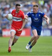 15 May 2022; Gareth McKinless of Derry in action against Ryan McAnespie of Monaghan during the Ulster GAA Football Senior Championship Semi-Final match between Derry and Monaghan at Athletic Grounds in Armagh. Photo by Ramsey Cardy/Sportsfile
