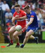 15 May 2022; Mícheál Bannigan of Monaghan in action against Ethan Doherty of Derry during the Ulster GAA Football Senior Championship Semi-Final match between Derry and Monaghan at Athletic Grounds in Armagh. Photo by Daire Brennan/Sportsfile
