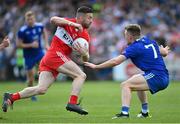 15 May 2022; Niall Loughlin of Derry in action against Conor McCarthy of Monaghan during the Ulster GAA Football Senior Championship Semi-Final match between Derry and Monaghan at Athletic Grounds in Armagh. Photo by Ramsey Cardy/Sportsfile