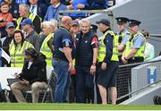 15 May 2022; Cork manager Kieran Kingston returns to the pitch after watching the match from the stand after being shown a yellow card by referee James Owens during the Munster GAA Hurling Senior Championship Round 4 match between Waterford and Cork at Walsh Park in Waterford. Photo by Stephen McCarthy/Sportsfile