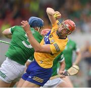 15 May 2022; Peter Duggan of Clare wins possession ahead of Mike Casey of Limerick during the Munster GAA Hurling Senior Championship Round 4 match between Clare and Limerick at Cusack Park in Ennis, Clare. Photo by Ray McManus/Sportsfile