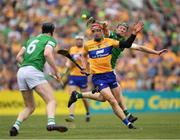 15 May 2022; John Conlon of Clare is tackled by William O'Donogue of Limerick during the Munster GAA Hurling Senior Championship Round 4 match between Clare and Limerick at Cusack Park in Ennis, Clare. Photo by Ray McManus/Sportsfile
