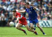 15 May 2022; Ethan Doherty of Derry in action against Karl O'Connell of Monaghan during the Ulster GAA Football Senior Championship Semi-Final match between Derry and Monaghan at Athletic Grounds in Armagh. Photo by Daire Brennan/Sportsfile