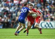 15 May 2022; Ethan Doherty of Derry in action against Karl O'Connell of Monaghan during the Ulster GAA Football Senior Championship Semi-Final match between Derry and Monaghan at Athletic Grounds in Armagh. Photo by Daire Brennan/Sportsfile