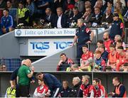 15 May 2022; Cork manager Kieran Kingston watches the match from the stand after being shown a yellow card by referee James Owens during the Munster GAA Hurling Senior Championship Round 4 match between Waterford and Cork at Walsh Park in Waterford. Photo by Stephen McCarthy/Sportsfile