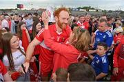 15 May 2022; Conor Glass of Derry with his mother Claire after the Ulster GAA Football Senior Championship Semi-Final match between Derry and Monaghan at Athletic Grounds in Armagh. Photo by Ramsey Cardy/Sportsfile