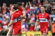 15 May 2022; Derry players, from left, Padraig Cassidy, Gareth McKinless and Paul McNeill celebrate at the final whistle of the Ulster GAA Football Senior Championship Semi-Final match between Derry and Monaghan at Athletic Grounds in Armagh. Photo by Ramsey Cardy/Sportsfile