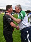 15 May 2022; Limerick manager John Kiely shakes hands with referee Colm Lyons after the Munster GAA Hurling Senior Championship Round 4 match between Clare and Limerick at Cusack Park in Ennis, Clare. Photo by Ray McManus/Sportsfile