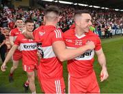 15 May 2022; Conor Doherty, left, and Niall Toner of Derry celebrate after the Ulster GAA Football Senior Championship Semi-Final match between Derry and Monaghan at Athletic Grounds in Armagh. Photo by Daire Brennan/Sportsfile