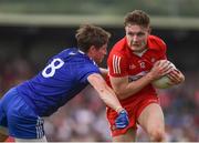 15 May 2022; Ethan Doherty of Derry in action against Darren Hughes of Monaghan during the Ulster GAA Football Senior Championship Semi-Final match between Derry and Monaghan at Athletic Grounds in Armagh. Photo by Daire Brennan/Sportsfile