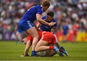 15 May 2022; Shane McGuigan of Derry in action against David Garland, right, and Kieran Duffy of Monaghan during the Ulster GAA Football Senior Championship Semi-Final match between Derry and Monaghan at Athletic Grounds in Armagh. Photo by Daire Brennan/Sportsfile