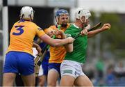 15 May 2022; Kyle Hayes of Limerick is tackled by Rory Hayes and Conor Cleary of Clare during the Munster GAA Hurling Senior Championship Round 4 match between Clare and Limerick at Cusack Park in Ennis, Clare. Photo by John Sheridan/Sportsfile