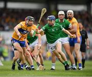 15 May 2022; David Reidy of Limerick in action against Cathal Malone of Clare during the Munster GAA Hurling Senior Championship Round 4 match between Clare and Limerick at Cusack Park in Ennis, Clare. Photo by John Sheridan/Sportsfile