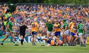 15 May 2022; Clare and Limerick players jostle each other during the Munster GAA Hurling Senior Championship Round 4 match between Clare and Limerick at Cusack Park in Ennis, Clare. Photo by John Sheridan/Sportsfile