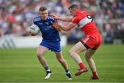15 May 2022; Conor McCarthy of Monaghan in action against Emmett Bradley of Derry during the Ulster GAA Football Senior Championship Semi-Final match between Derry and Monaghan at Athletic Grounds in Armagh. Photo by Ramsey Cardy/Sportsfile
