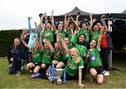 16 May 2022; Peamount United players celebrate with the trophy after the 2022 Clubforce DDSL Girls U13 League Cup Final match, the first time the DDSL has held a schoolgirls' final, between Stepaside FC and Peamount United at the AUL in Dublin. Photo by Harry Murphy/Sportsfile