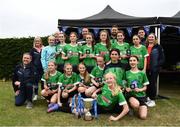 16 May 2022; Peamount United players celebrate with the trophy after the 2022 Clubforce DDSL Girls U13 League Cup Final match, the first time the DDSL has held a schoolgirls' final, between Stepaside FC and Peamount United at the AUL in Dublin. Photo by Harry Murphy/Sportsfile