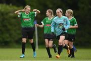 16 May 2022; Ella-Grace Cummins of Peamount United, left, and teammates celebrate during the 2022 Clubforce DDSL Girls U13 League Cup Final match between Stepaside FC and Peamount United at the AUL in Dublin. Photo by Harry Murphy/Sportsfile